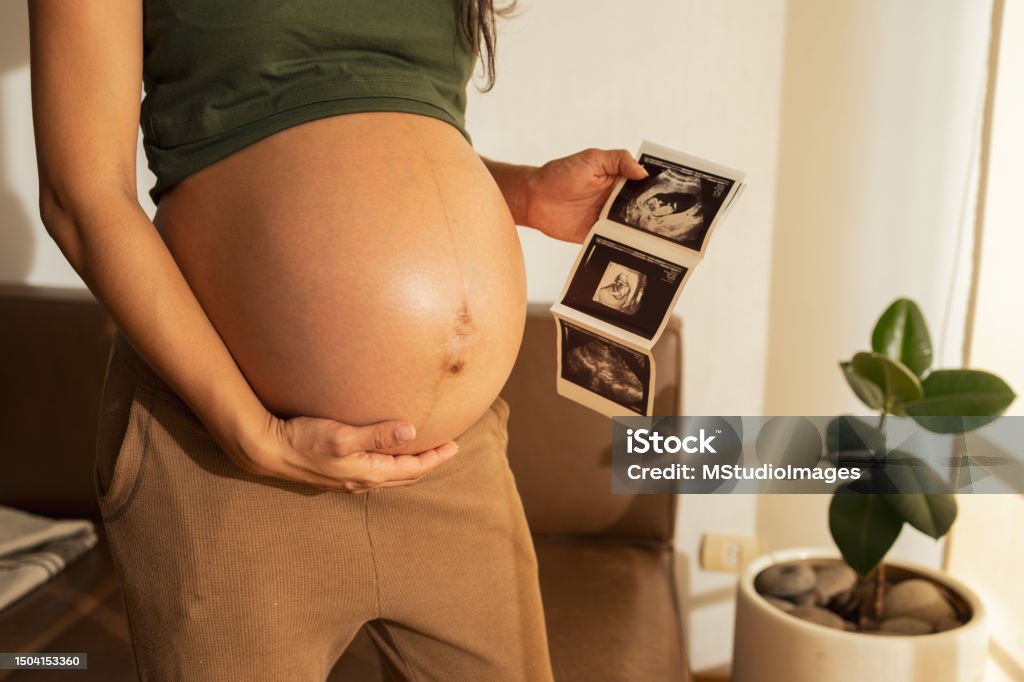 pregnant stomach with ultrasound image